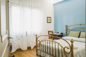 Voodi või voodid majutusasutuse Lucignolo toas