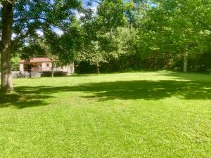Zahrada ubytování Logement type 2 dans un parc verdoyant