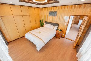 En eller flere senge i et værelse på ZSF-Kameido House -KT0413