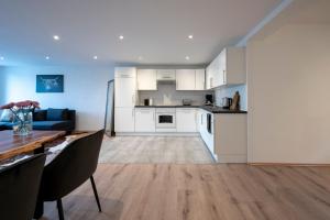 Køkken eller tekøkken på Modernes, stilvolles Apartment 2 + 11 billeder