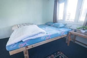 Postel nebo postele na pokoji v ubytování Amadablam Base Camp Lodge