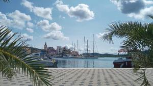 a view of a marina with boats in the water at Apartman AS in Pirovac