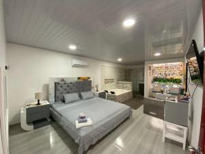 Ένα ή περισσότερα κρεβάτια σε δωμάτιο στο Hotel Inmaculada Real