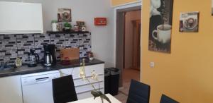 Kuchyň nebo kuchyňský kout v ubytování Ferienhaus Erika