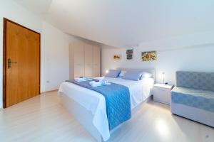 Ένα ή περισσότερα κρεβάτια σε δωμάτιο στο Apartment Pijaceta
