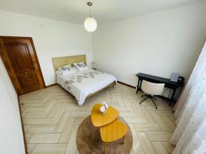 Ein Bett oder Betten in einem Zimmer der Unterkunft Tia Vahine