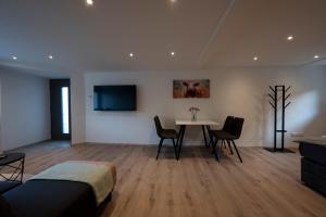 Et opholdsområde på Modernes, stilvolles Apartment 3 + 10 billeder