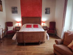 Giường trong phòng chung tại Le haut Manoir +15 ảnh