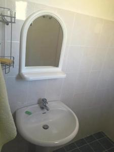 Kylpyhuone majoituspaikassa Vila Melpo Apartments