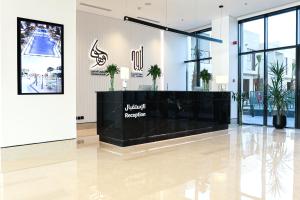 a lobby with a reception desk in a building at Hafawah Resort in Medina +80 photos