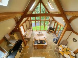 an overhead view of a living room with an attic at Swn Y Nant Lodge with hot tub Brecon in Brecon