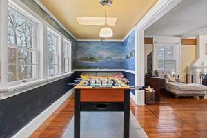 a room with a chess table in the middle of it at NEW Cayuga, Hot Tub, Dog Friendly, Wine Trail in Cayuga