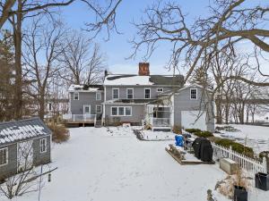 a house with snow on the ground in front of it at NEW Cayuga, Hot Tub, Dog Friendly, Wine Trail in Cayuga