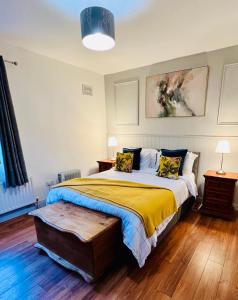Postel nebo postele na pokoji v ubytování Acrewood House