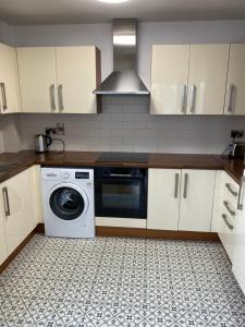 Kuchyň nebo kuchyňský kout v ubytování Holiday apartment Tralee
