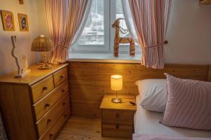 Postel nebo postele na pokoji v ubytování Apartmán Velké Karlovice