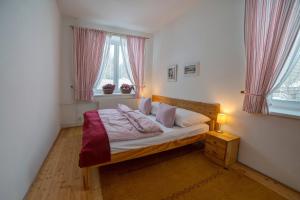 Postel nebo postele na pokoji v ubytování Apartmán Velké Karlovice