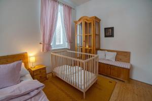 Postel nebo postele na pokoji v ubytování Apartmán Velké Karlovice