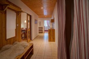 Postel nebo postele na pokoji v ubytování Apartmán Velké Karlovice