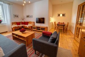 TV a/nebo společenská místnost v ubytování Apartmán Velké Karlovice