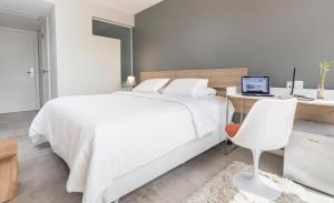Hub Hotel Asuncionにあるベッド
