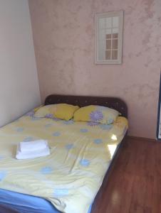 Postel nebo postele na pokoji v ubytování Apartman Šumski San