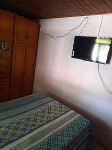 Televisyen dan/atau pusat hiburan di Residência do Roberto