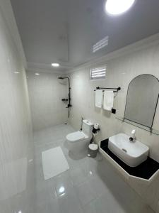 Koupelna v ubytování Thoddoo Cozy Stay