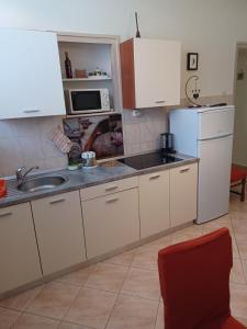 Kuchyň nebo kuchyňský kout v ubytování Nena City Center Apartment