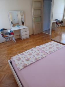 Postel nebo postele na pokoji v ubytování Nena City Center Apartment