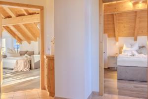 Katil atau katil-katil dalam bilik di Tutzing Seeblick Apartment mit Balkon