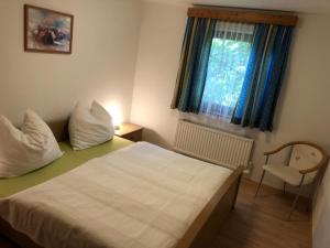 Posteľ alebo postele v izbe v ubytovaní Schöne Gartenwohnung mit Blick ins Grüne