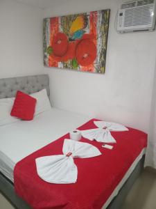 Postel nebo postele na pokoji v ubytování Hostal Asturias Real