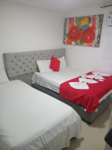 Postel nebo postele na pokoji v ubytování Hostal Asturias Real