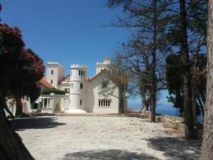 a large white house with aventh floor at L'ombre appart in Tangier