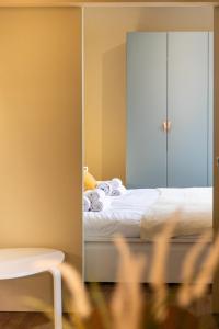 Adige Suite in the heart of Verona房間的床
