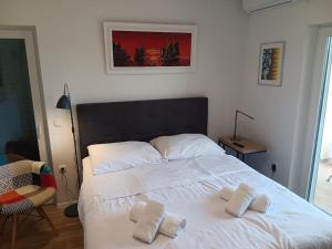 Postel nebo postele na pokoji v ubytování Ferienwohnung Slava