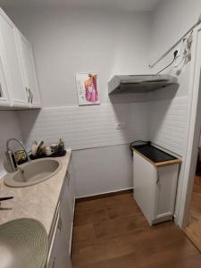 Η κουζίνα ή μικρή κουζίνα στο Nadja City Center