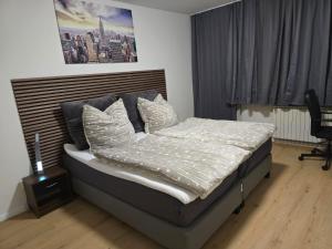 Postel nebo postele na pokoji v ubytování AlSa Apartments