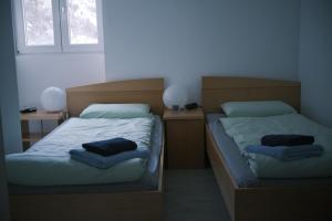 Postelja oz. postelje v sobi nastanitve Today Appartement Famille