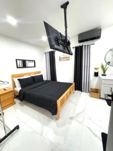 Postel nebo postele na pokoji v ubytování Amour Condo