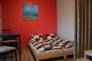 Postel nebo postele na pokoji v ubytování Hotel Mergera