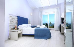 Giường trong phòng chung tại Bajaloglia Resort