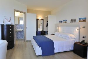 Giường trong phòng chung tại Bajaloglia Resort