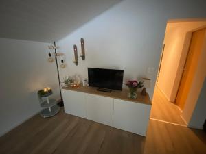 TV o dispositivi per l'intrattenimento presso Ferienwohnung in Mörel