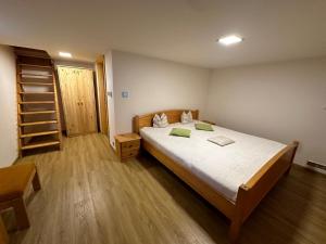 Postel nebo postele na pokoji v ubytování Chalet Galla
