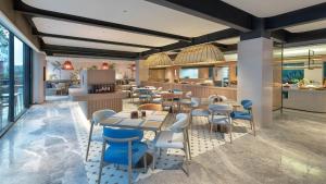 Εστιατόριο ή άλλο μέρος για φαγητό στο Holiday Inn Express Puer Simao by IHG