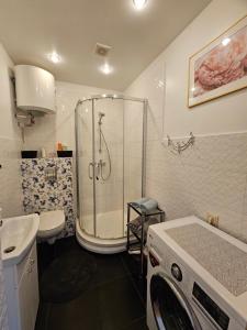 Et badeværelse på L' - city' Reina' apartments'