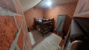 an overhead view of a small room with a dog at Cabana Floare in Straja