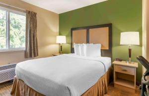 Postel nebo postele na pokoji v ubytování Extended Stay Cary